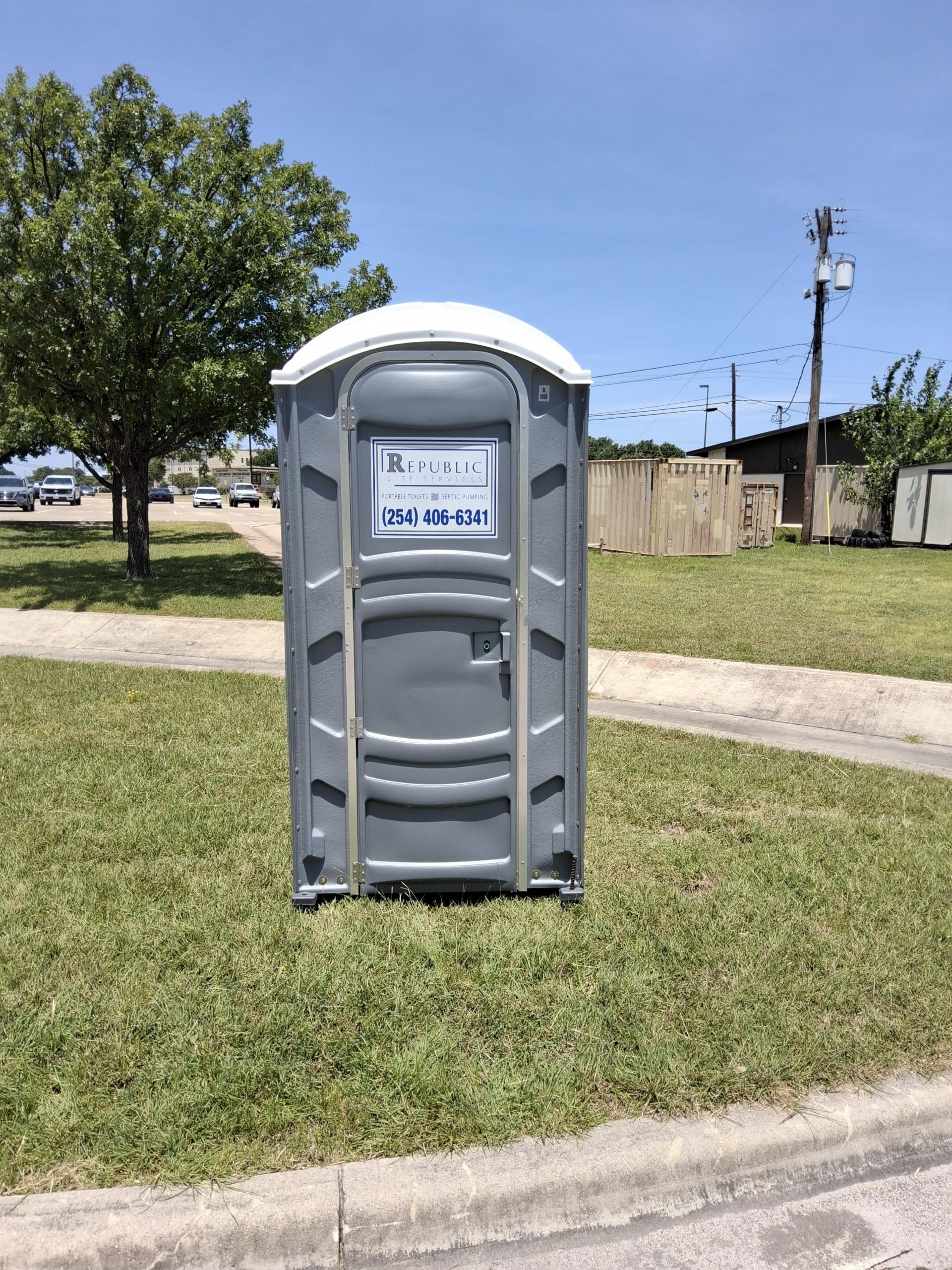 Single Portable Toilet Rental Unit on Grassy Area in Salado, TX