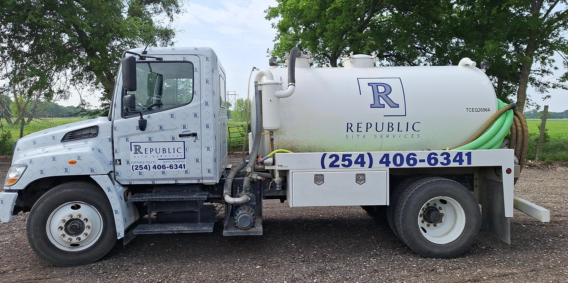 Septic Pumping Truck with Republic Site Services Branding Parked Outdoors